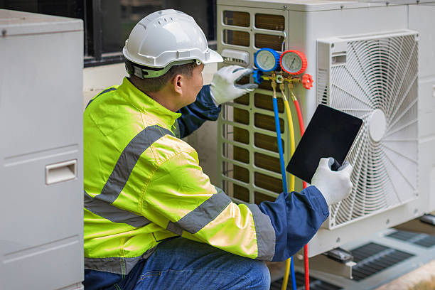 Professional Heat Pump Repair technician working in Lowell, WI